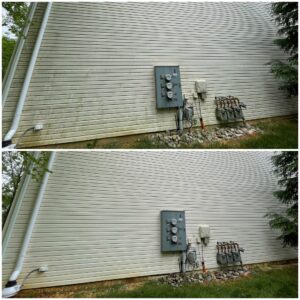 Side of a house power washed by Oddly Satisfying Pressure Washing
