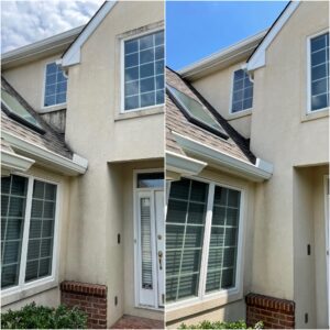 Side of a house cleaned by Oddly Satisfying Pressure Washing