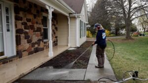 Oddly Satisfying Pressure Washing employee pressure washing an outdoor entryway
